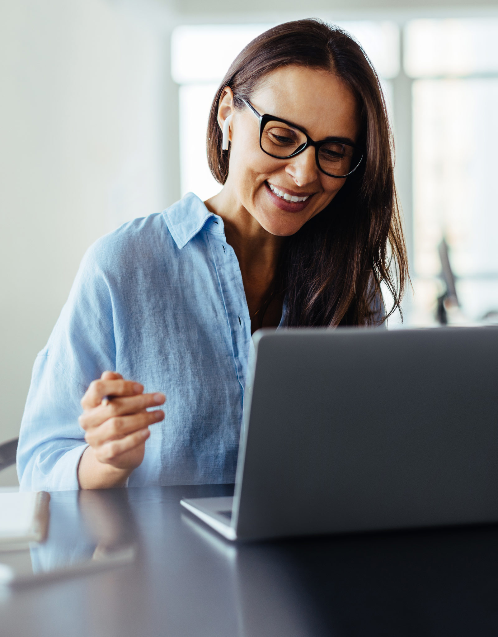 Woman having an online business meeting in an office